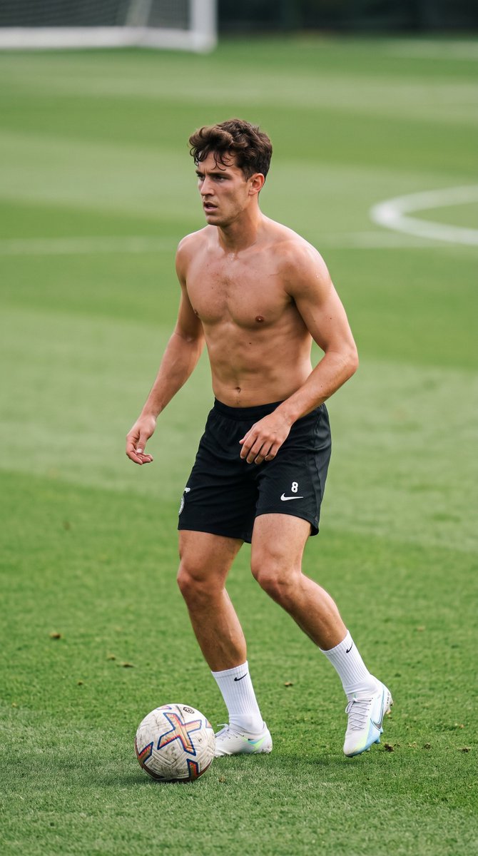 Ultra-realistic candid sports photograph of a young adult male footballer train…